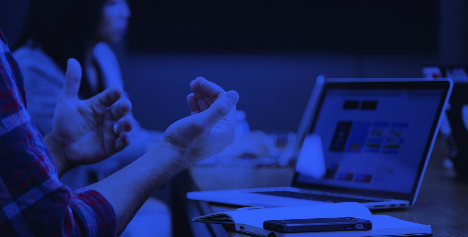 Academy image with someone working on a laptop