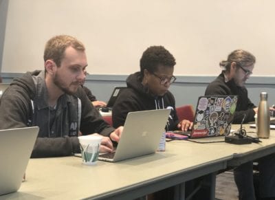 InCommon workshop attendees are shown working on their laptops at a recent workshop.